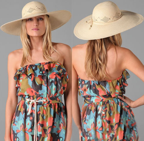 Wide-brimmed straw hat with hollow out design